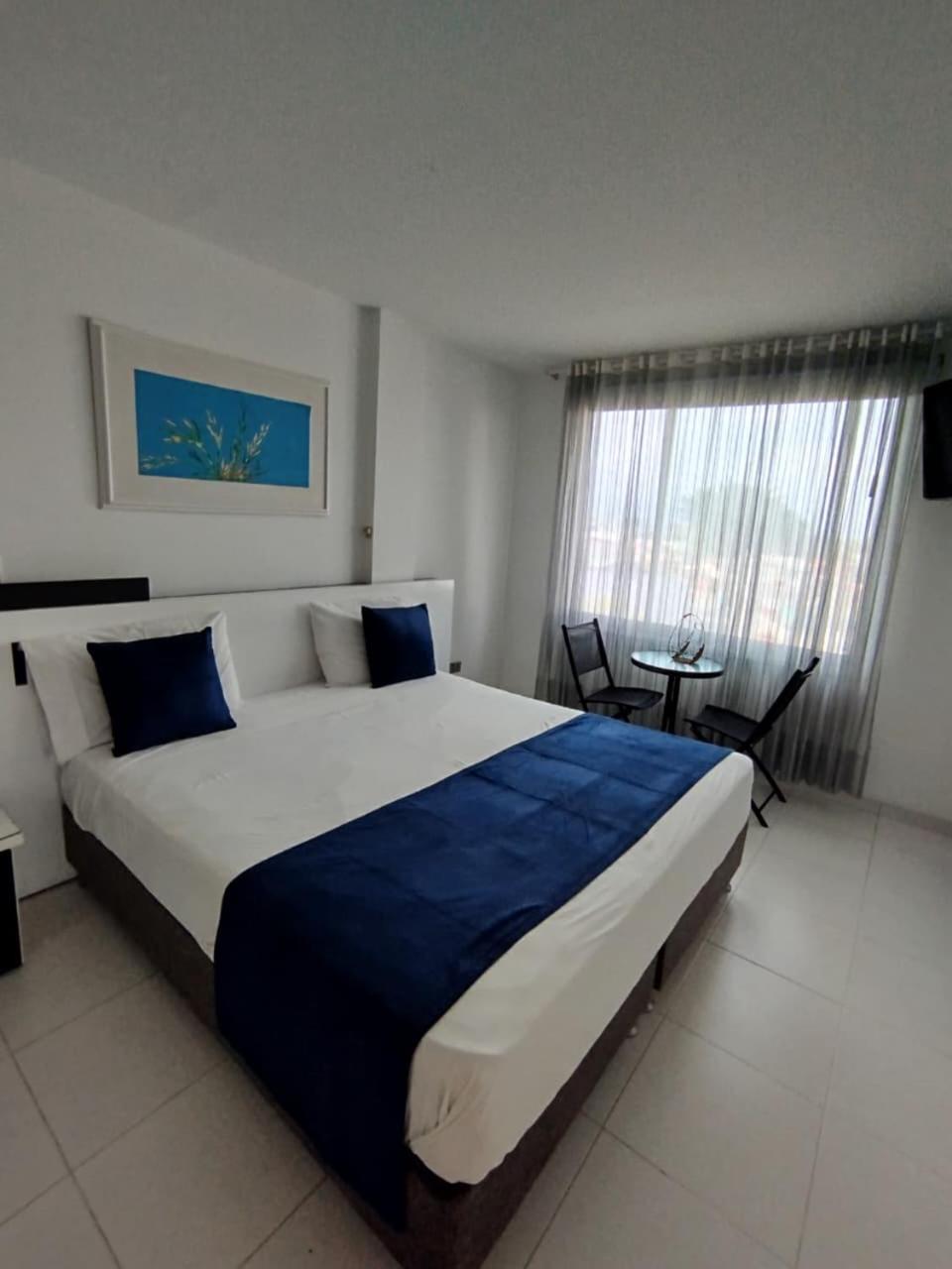 Hotel Bahia Villavicencio Kamer foto
